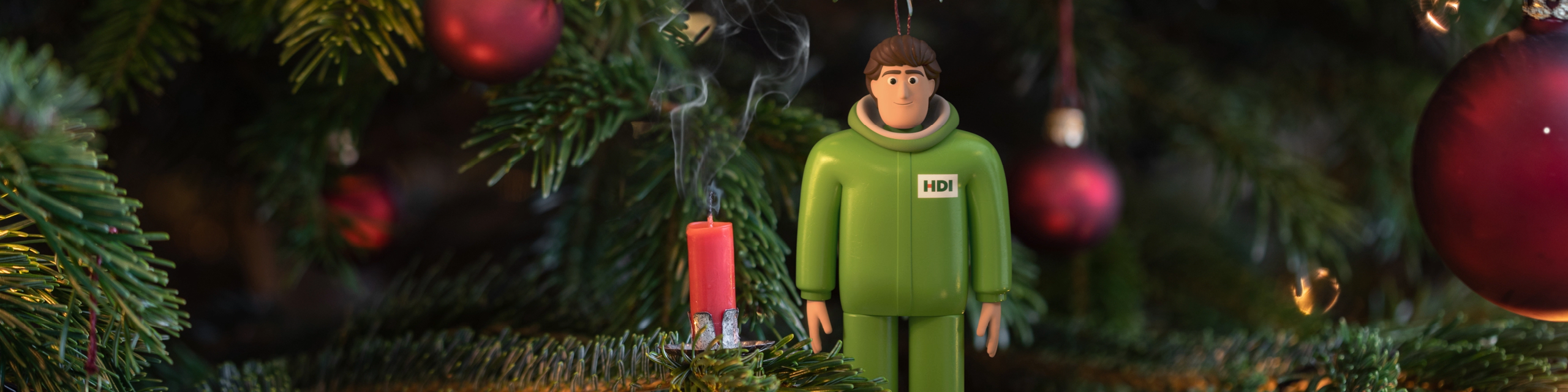 HDI Brand Character mit ausgeblasener Kerze